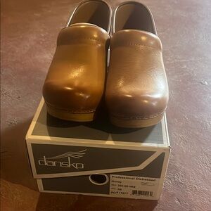 Dansko Brown Mules and Clogs with Smooth Leather-like Material and Sturdy Sole